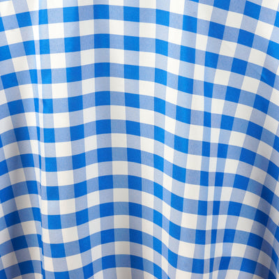 Blue and white gingham fabric texture close-up.