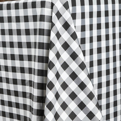 Black and white checkered tablecloth draped elegantly.