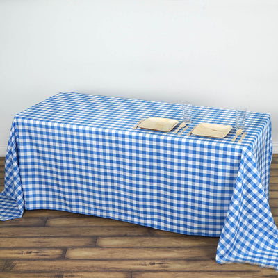 Blue and white gingham tablecloth draped over a rectangular table.