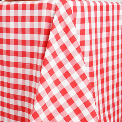 Red and white checkered tablecloth draped over a table.