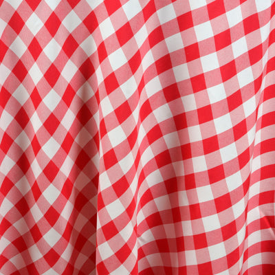 Red and white checkered fabric texture close-up.