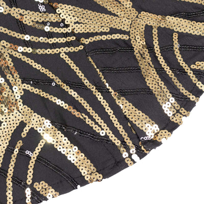 Black fabric with gold sequins in a stylish pattern.
