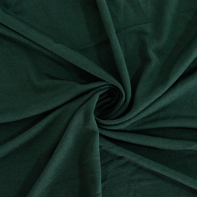 Dark green fabric texture, soft and smooth draped elegantly.