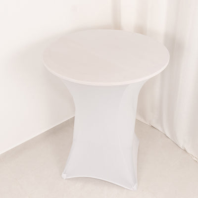 White round table with a fitted white cover