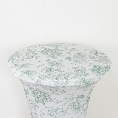 Floral-patterned table with a round top and tapered base on a white background