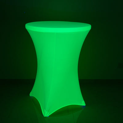Glowing green table with a modern design for events or parties.