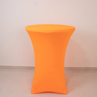 Orange stretch table cover on a round table