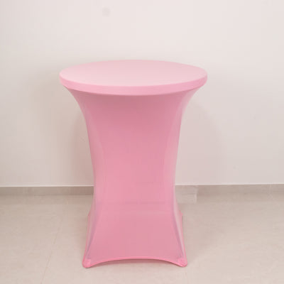Pink round table with a sleek design for modern decor.