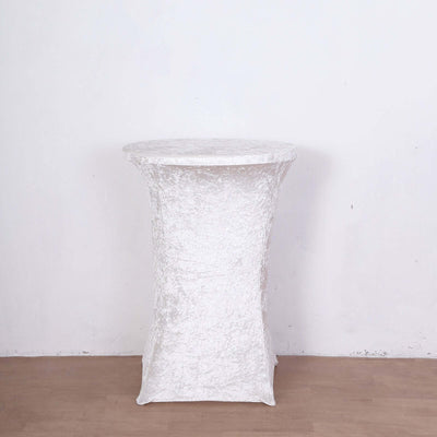 White round table with textured surface on plain background