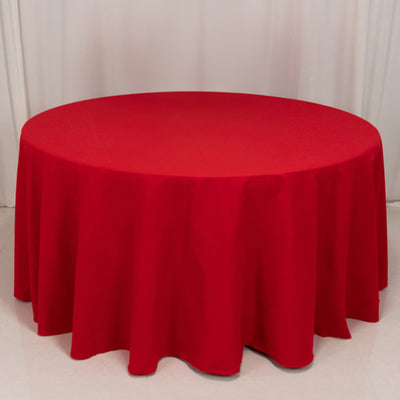 Red round tablecloth on a white background