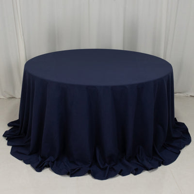 Navy round tablecloth with elegant draping