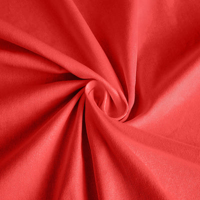 Red fabric texture in a swirling pattern.