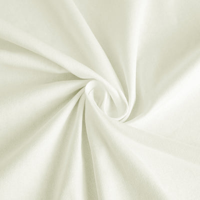 White fabric close-up showcasing soft texture and drape.