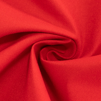 Red fabric texture close-up showing soft, smooth material details.