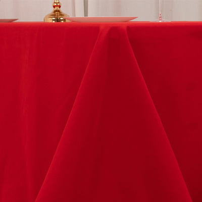 Red tablecloth draping elegantly over a table.
