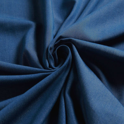 Deep blue fabric with smooth texture and elegant drape. #whtbkgd