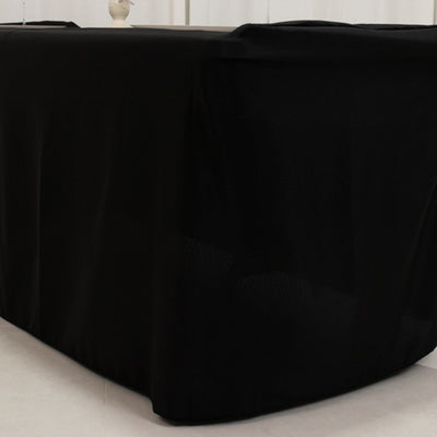 Black tablecloth draped over a table for elegant dining setups.