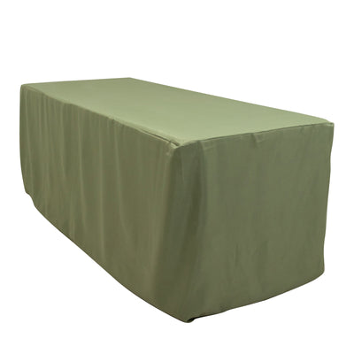 Green table cover draped over a rectangular table