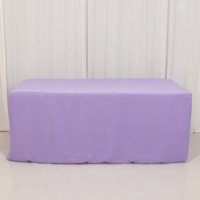 Purple table cover on a plain backdrop