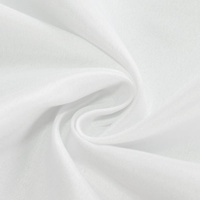 White fabric texture with soft folds and creases.