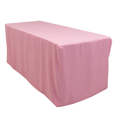 Pink table cover draped over a rectangular table