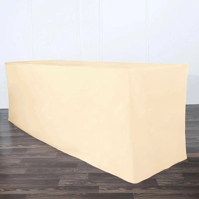 Beige table cover draped over a rectangular table.