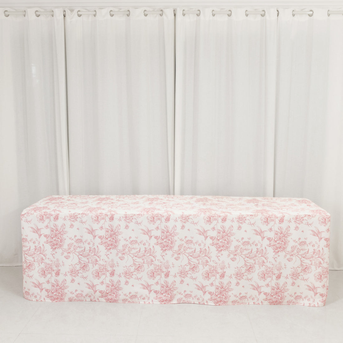 Floral-patterned table cover on a white background