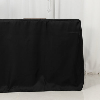 Black tablecloth on a table in a stylish setting.