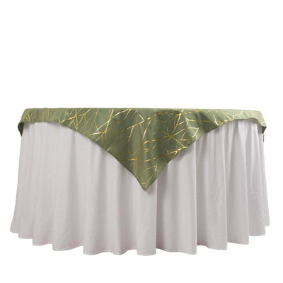 Green tablecloth with gold geometric design on a white table.
