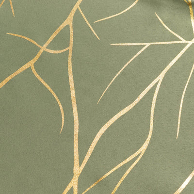 Gold leaf pattern on green fabric.