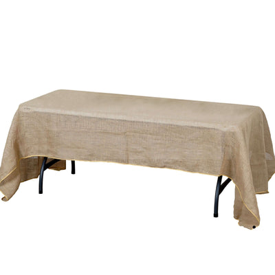 Natural burlap table cover on a folding table