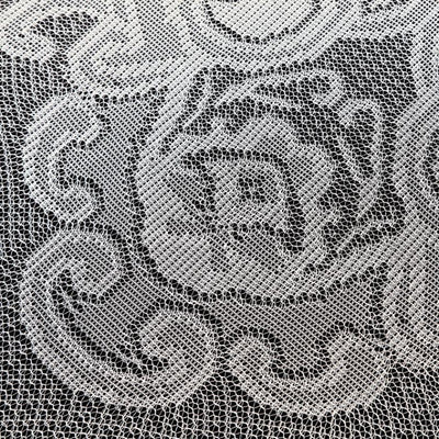 White lace fabric with floral pattern detail.