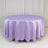 Round lavender tablecloth with elegant draping.