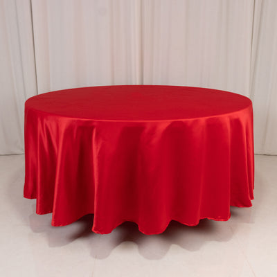 Red round tablecloth, ideal for events and dining settings.