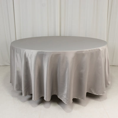 Round satin tablecloth in soft gray color.
