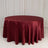Burgundy round tablecloth draping elegantly over a table