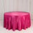 Round pink satin tablecloth draped on a round table