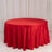 Red round tablecloth draped elegantly over a circular table.