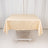 Cream tablecloth draped over a folding table