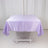 Lavender satin tablecloth draped over a folding table