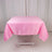 Pink satin tablecloth draped over a folding table