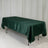 Green satin tablecloth draped over a rectangular table