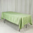 Green satin tablecloth on a folding table