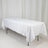 White tablecloth on a folding table against a light backdrop
