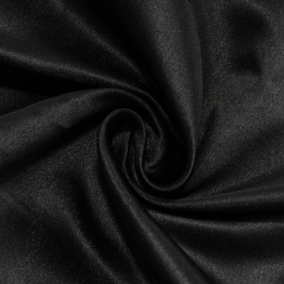 Black satin fabric with a smooth, shiny texture.