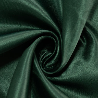 Dark green satin fabric with a smooth, lustrous finish.