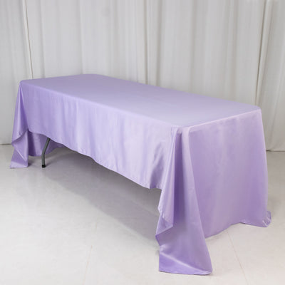 Lavender tablecloth draped over a table, showcasing smooth fabric texture.