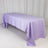 Lavender tablecloth draped over a table, showcasing smooth fabric texture.