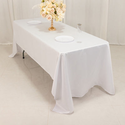 Elegant white tablecloth draped over a table, ideal for events and dining.