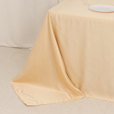 Peach-colored tablecloth draped over a table